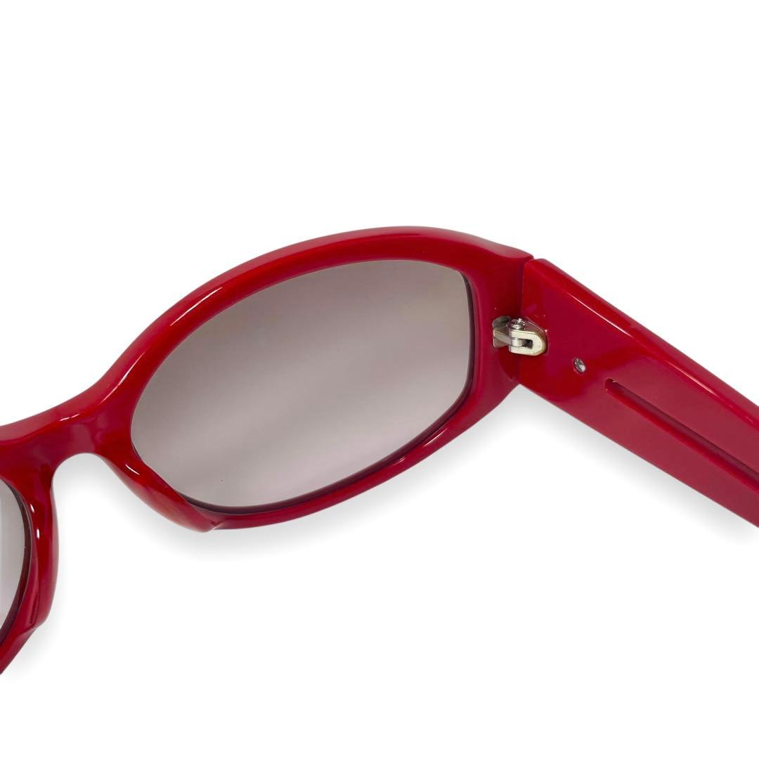 プラダスポーツ　サングラス　レッド　サイドロゴ