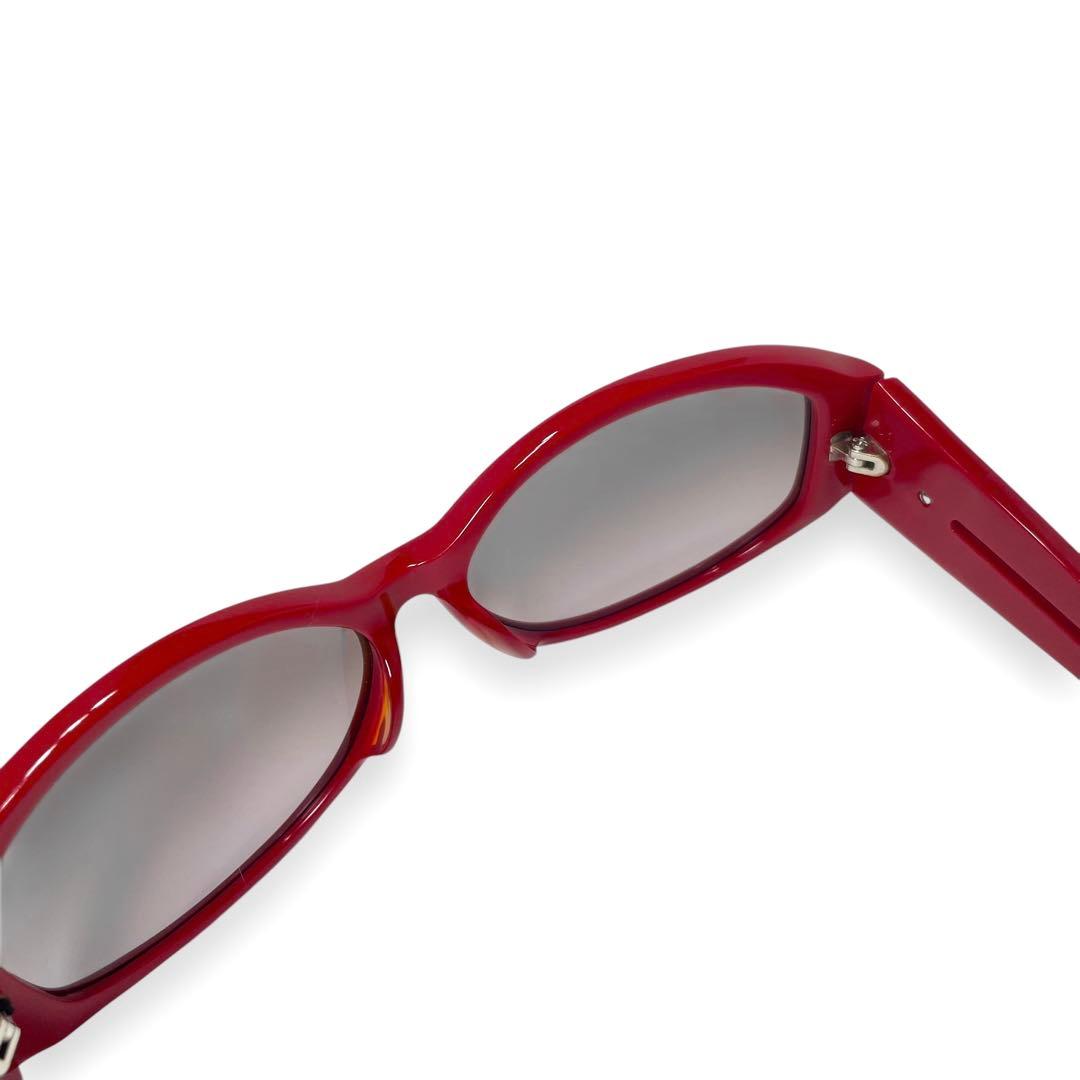 プラダスポーツ　サングラス　レッド　サイドロゴ