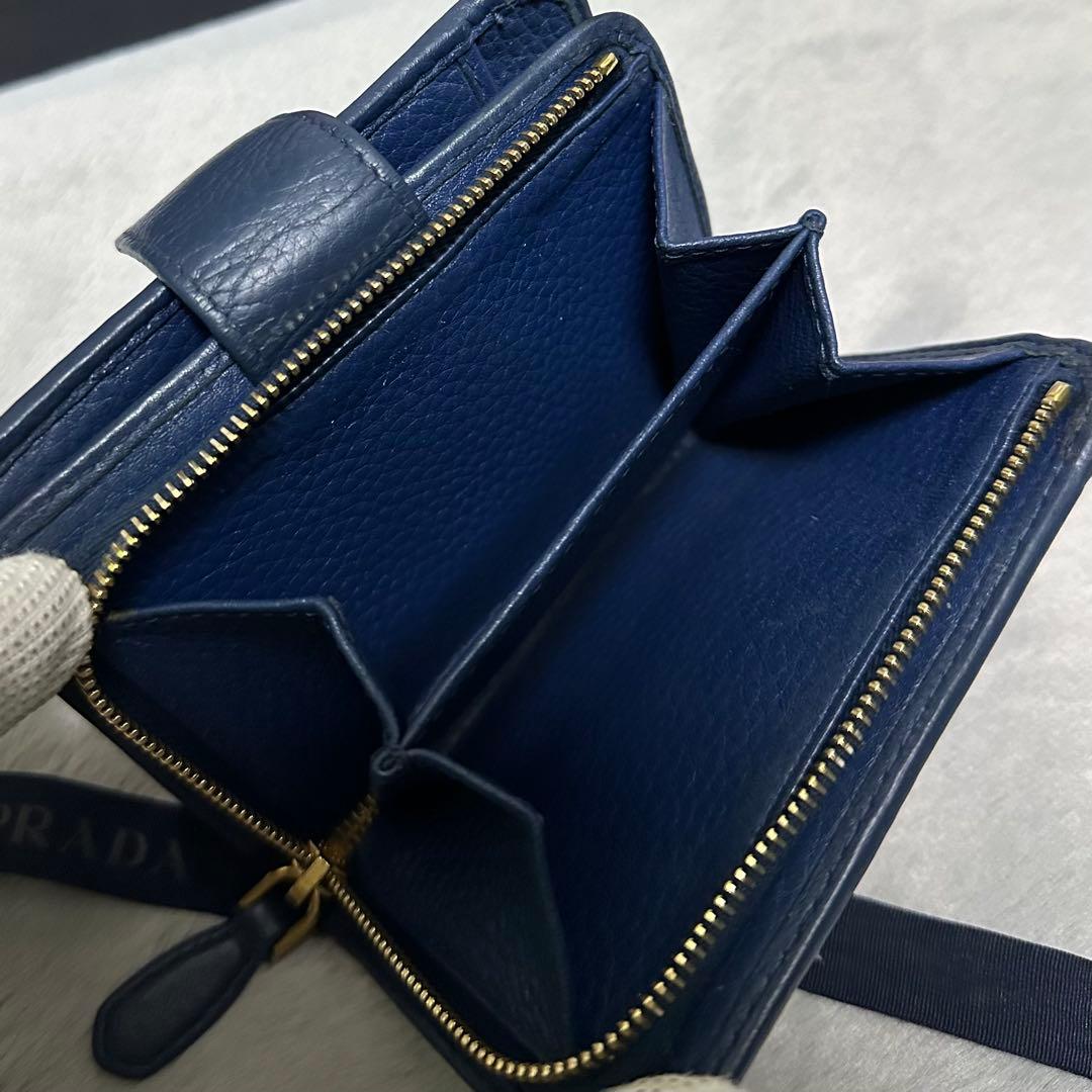 PRADA プラダ　折り財布　ラウンドファスナー　ブルー　ゴールドロゴ シボ革
