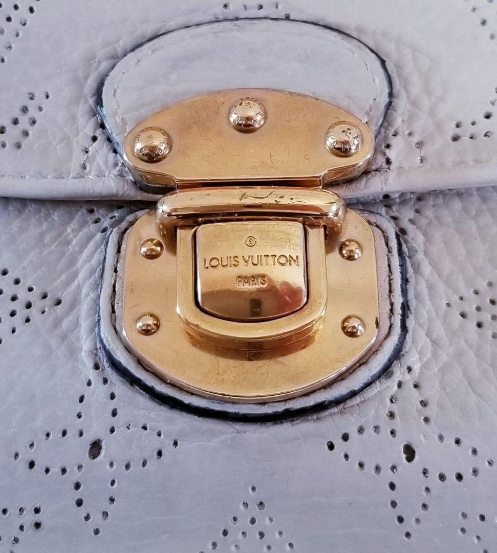 ルイヴィトン モノグラム パンチング マヒナ ポルトフォイユ アメリア 長財布