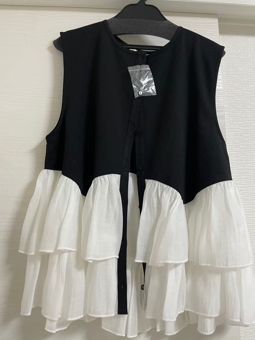 UNMINOU ペプラムティアードトップス