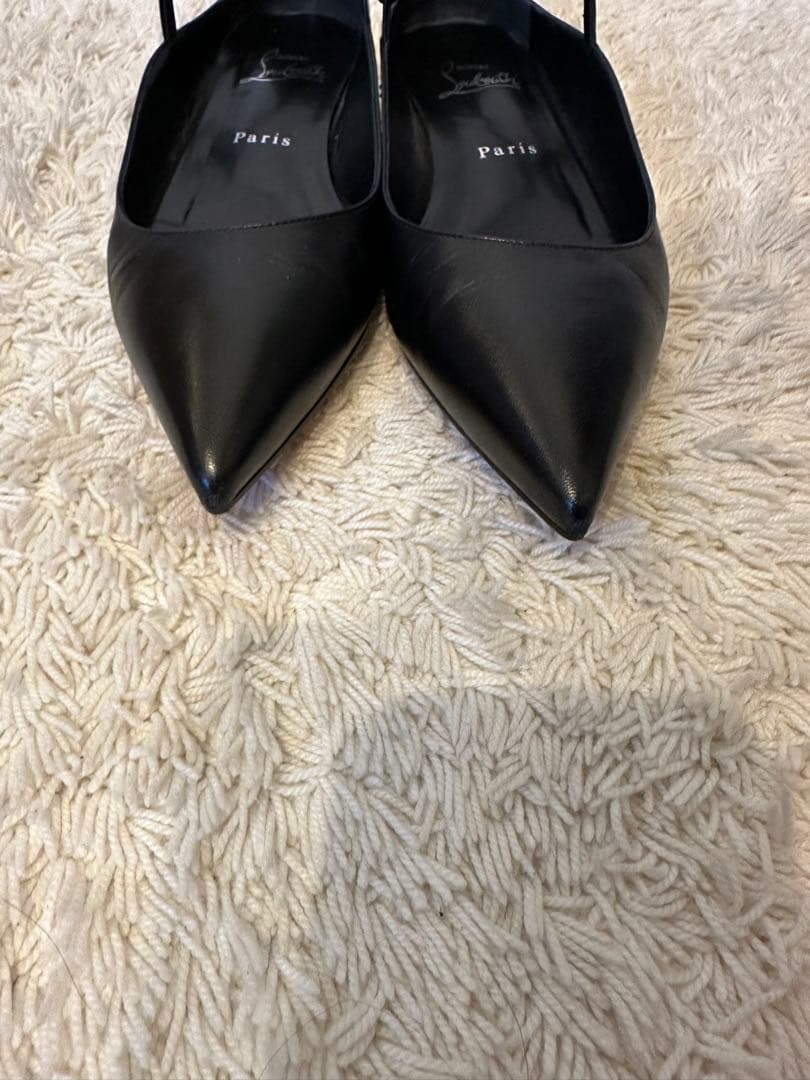 Christian Louboutin 黒 フラットシューズ スタッズ付きヒール