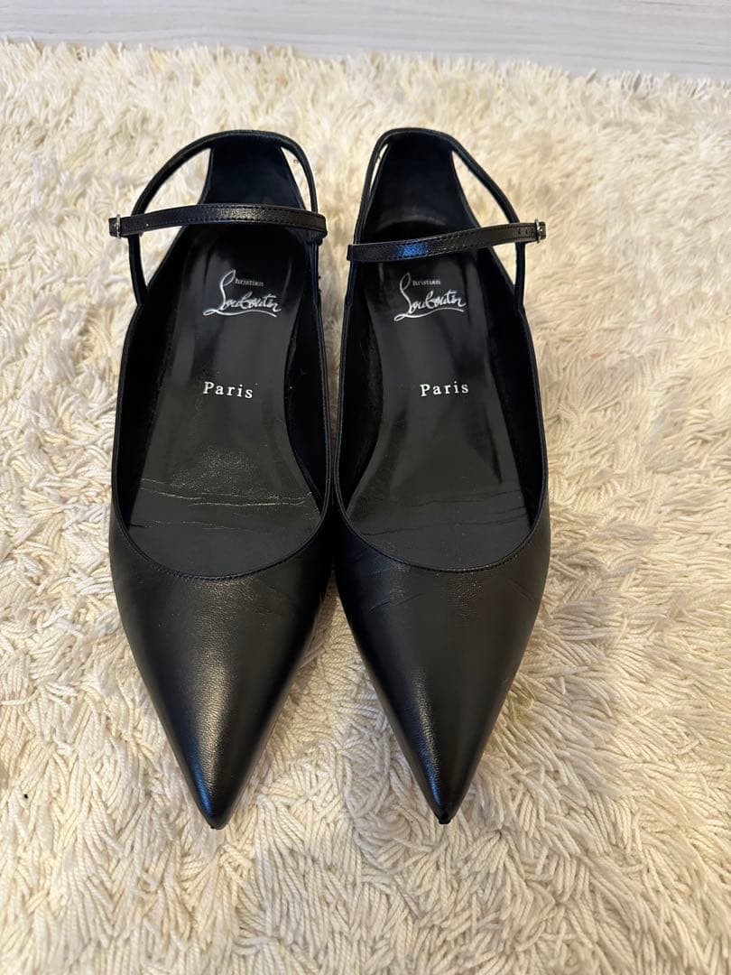 Christian Louboutin 黒 フラットシューズ スタッズ付きヒール