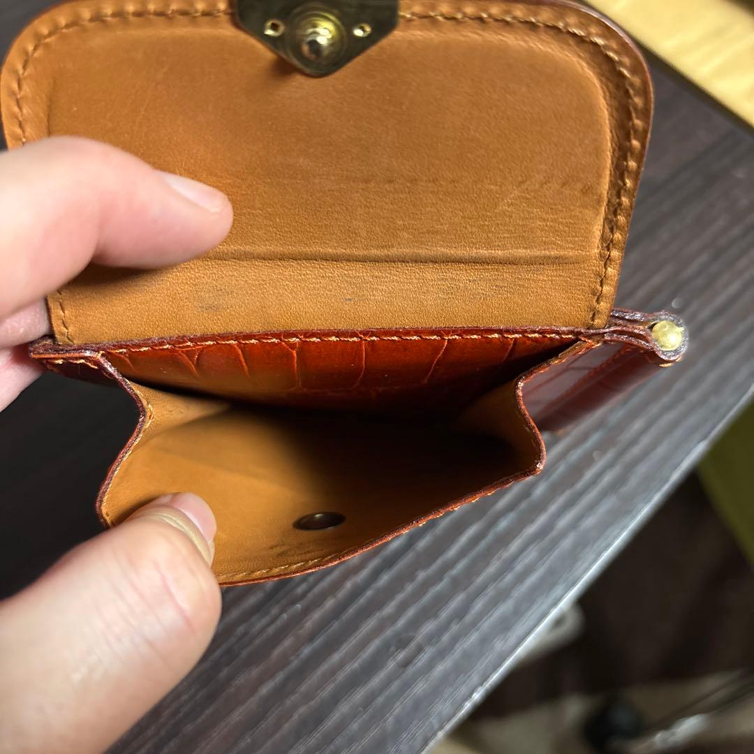 Felisi オレンジレザー マネークリップ クロコダイル型押し