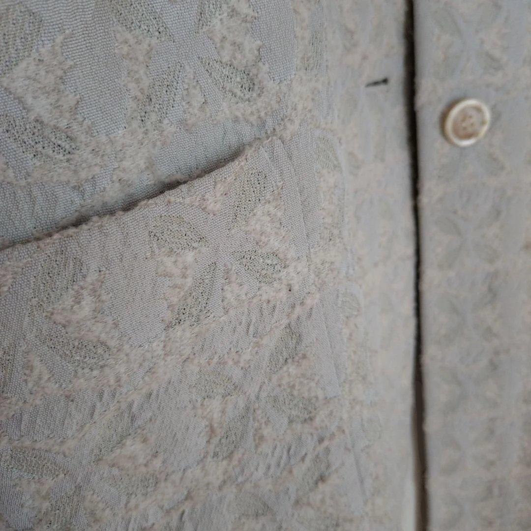 nooyボタン付きライトグレーコート