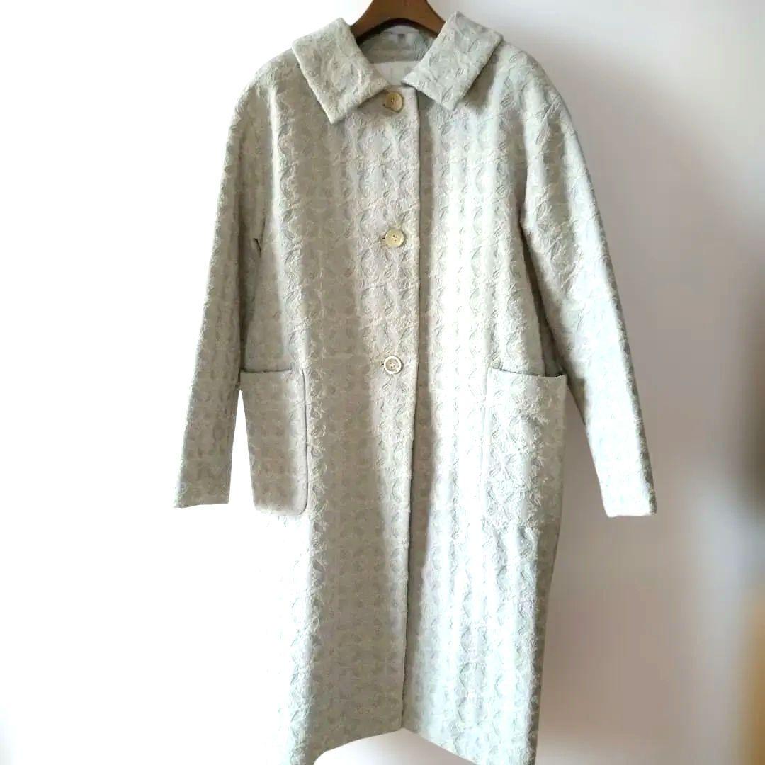 nooyボタン付きライトグレーコート