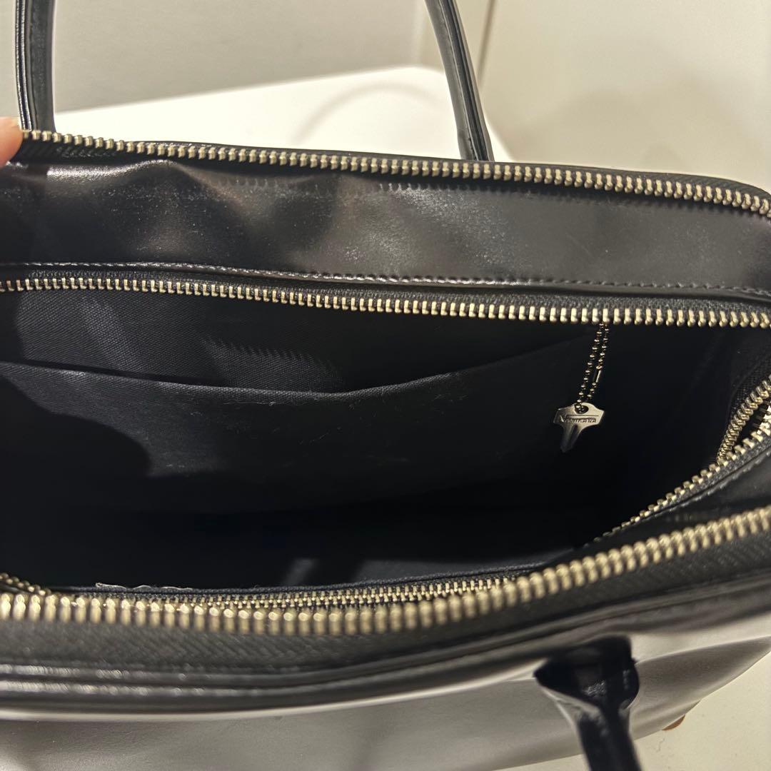 コムデギャルソン　ジップハンドバッグ