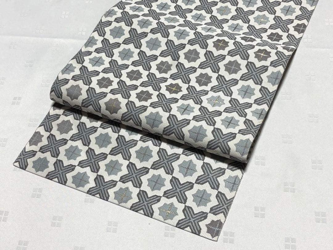 未使用品　和服帯　正絹　十字繋ぎ.幾何学模様　名古屋帯(帯封付) 早い者勝ち