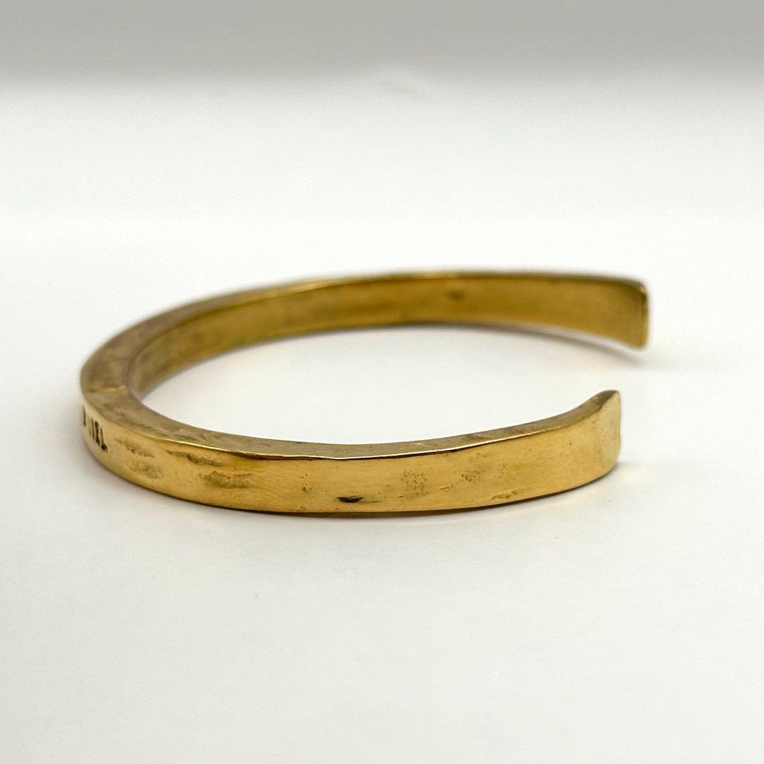 【良品】 セルジュトラヴァル バングル ゴールドカラー 座って空を見上げてごらん