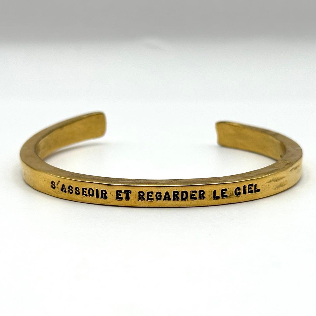 【良品】 セルジュトラヴァル バングル ゴールドカラー 座って空を見上げてごらん