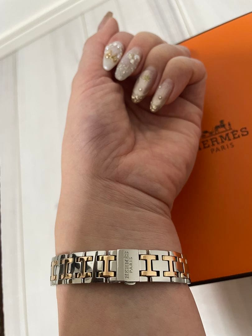 HERMESエルメスクリッパーナクレダイヤベゼルシェル文字盤コンビ腕時計