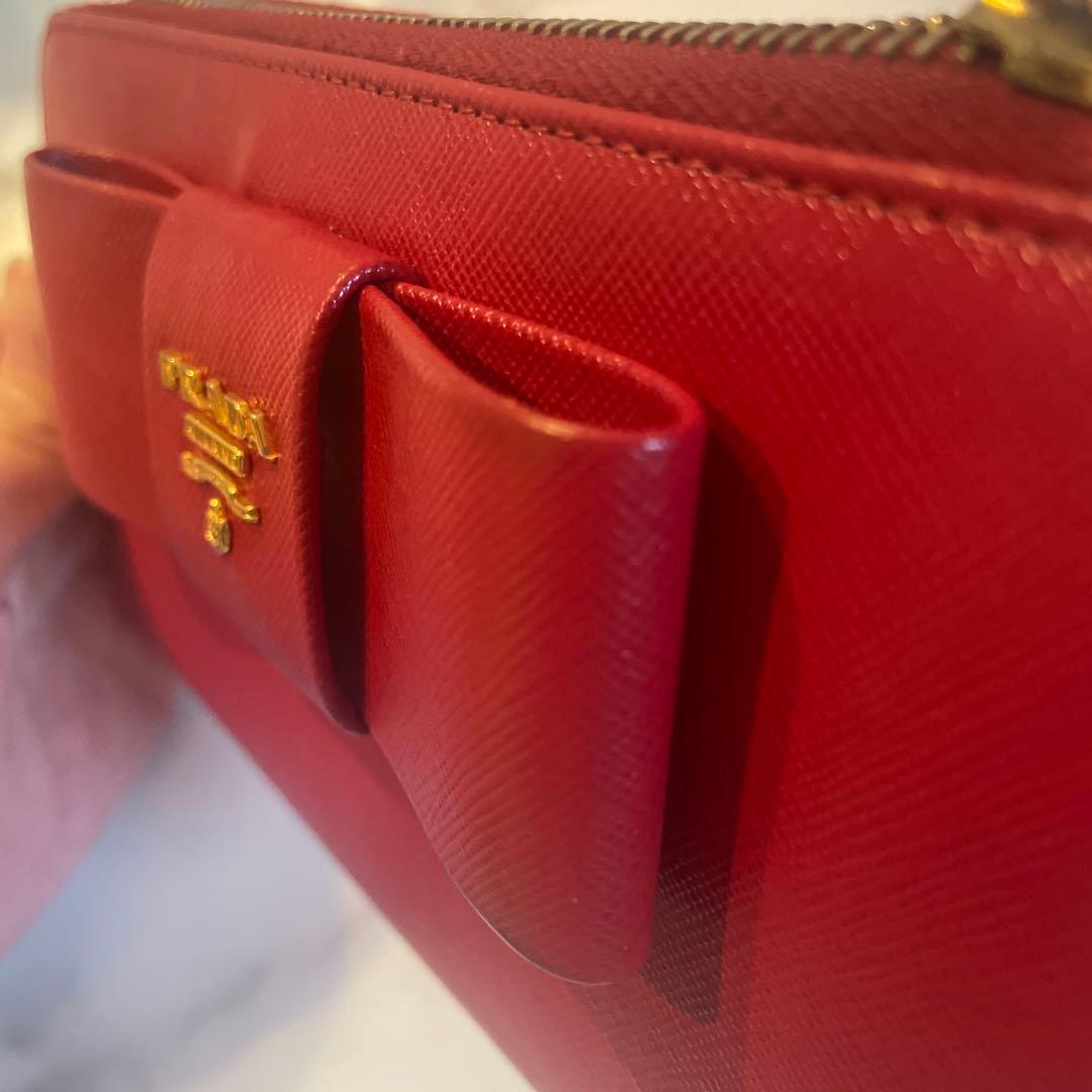 プラダ　リボン　長財布　ゴールド金具　赤　サフィアーノレザー