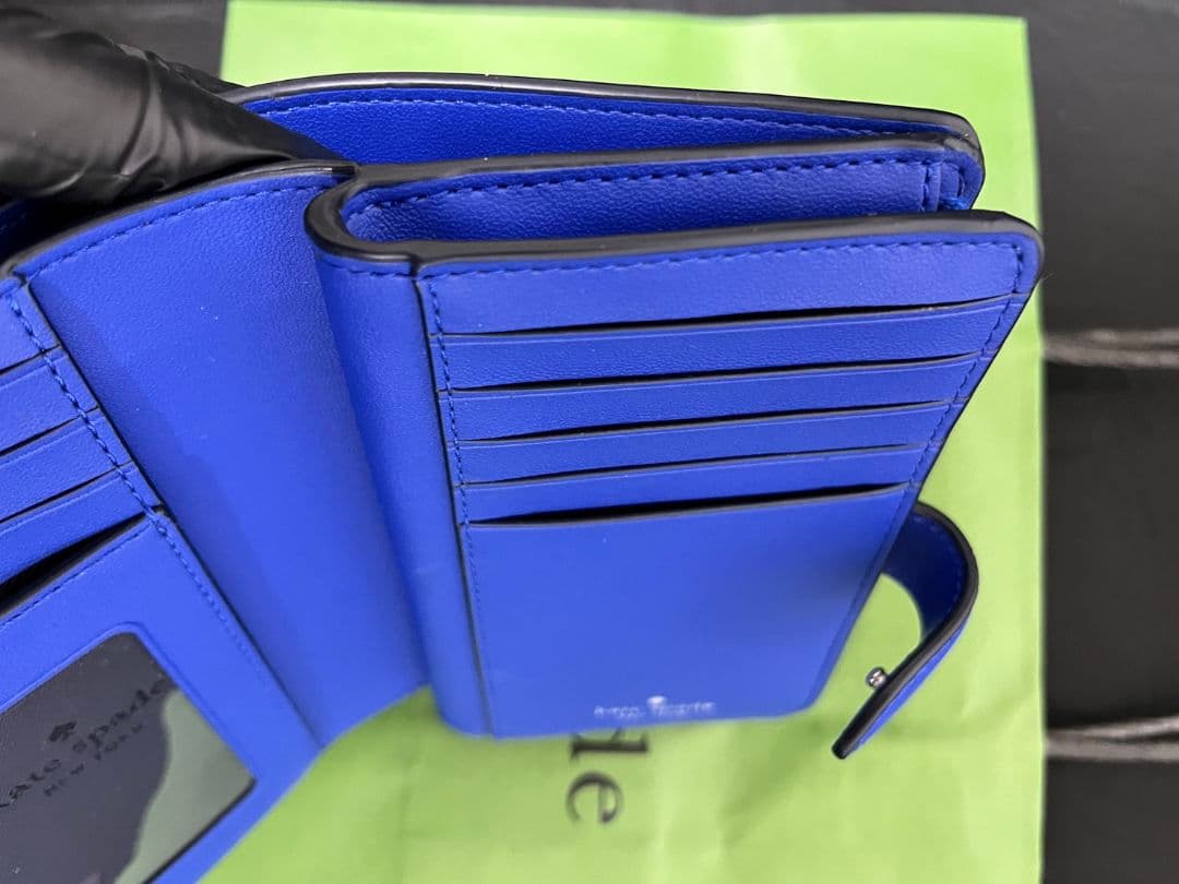 ケイトスペード 二つ折り財布 kate spade シュイラー ウェーブ ストラ