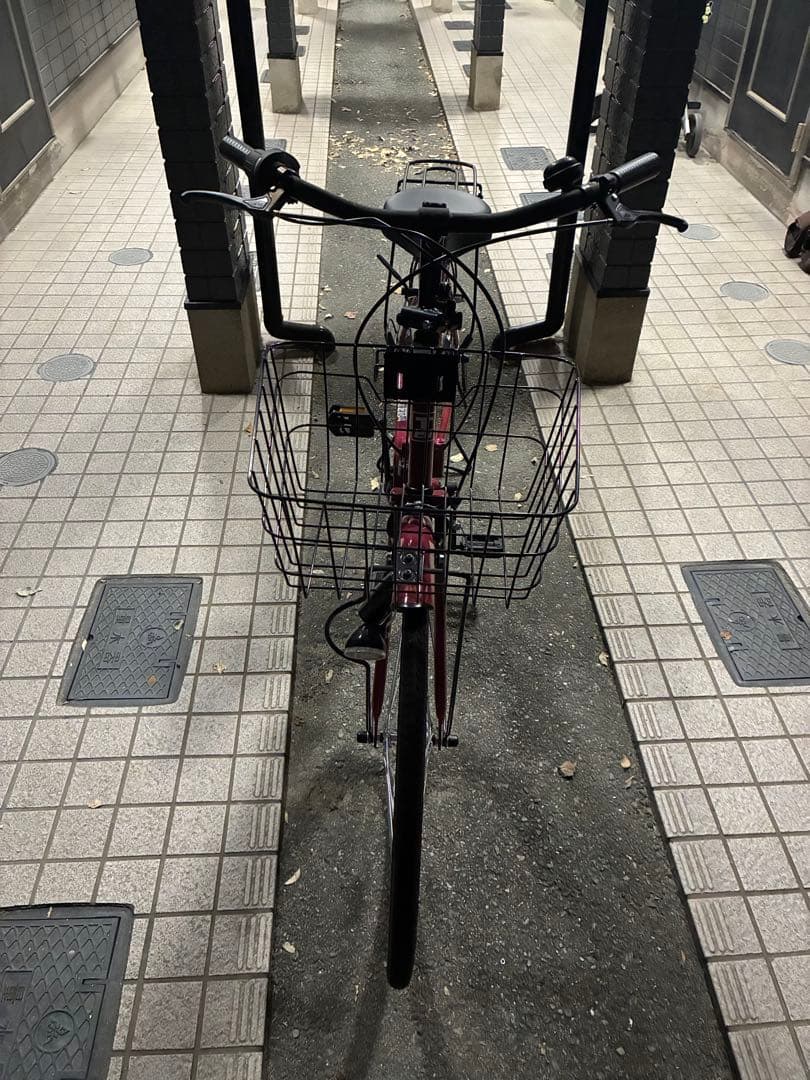 赤い折りたたみ自転車 前面バスケット付き