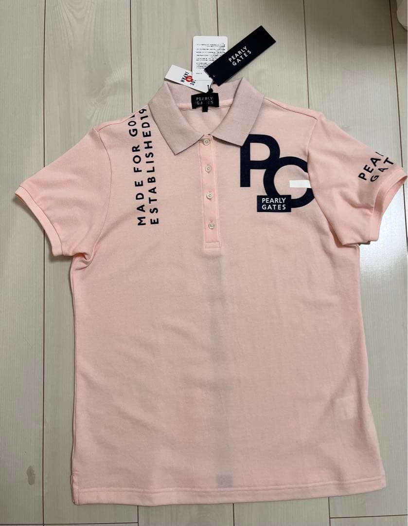 新品タグ付き　即完売さくら色ポロシャツ　スカートも出品してますよー