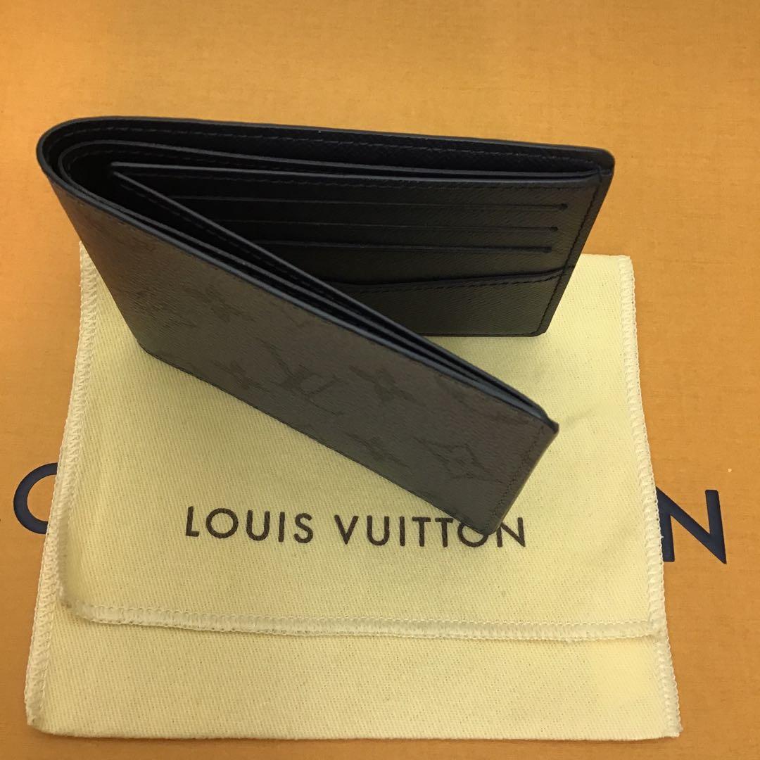 ❣️未使用に近い❣️ LOUIS VUITTON 二つ折り財布　M80906