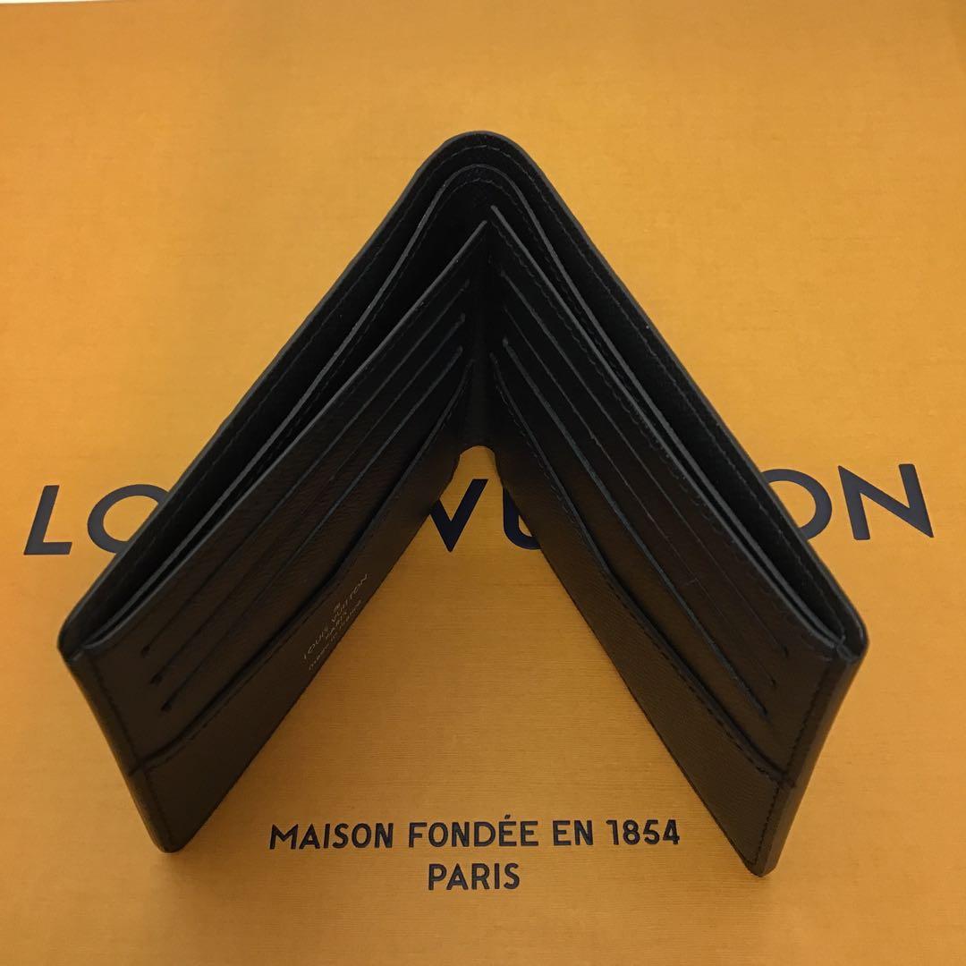 ❣️未使用に近い❣️ LOUIS VUITTON 二つ折り財布　M80906