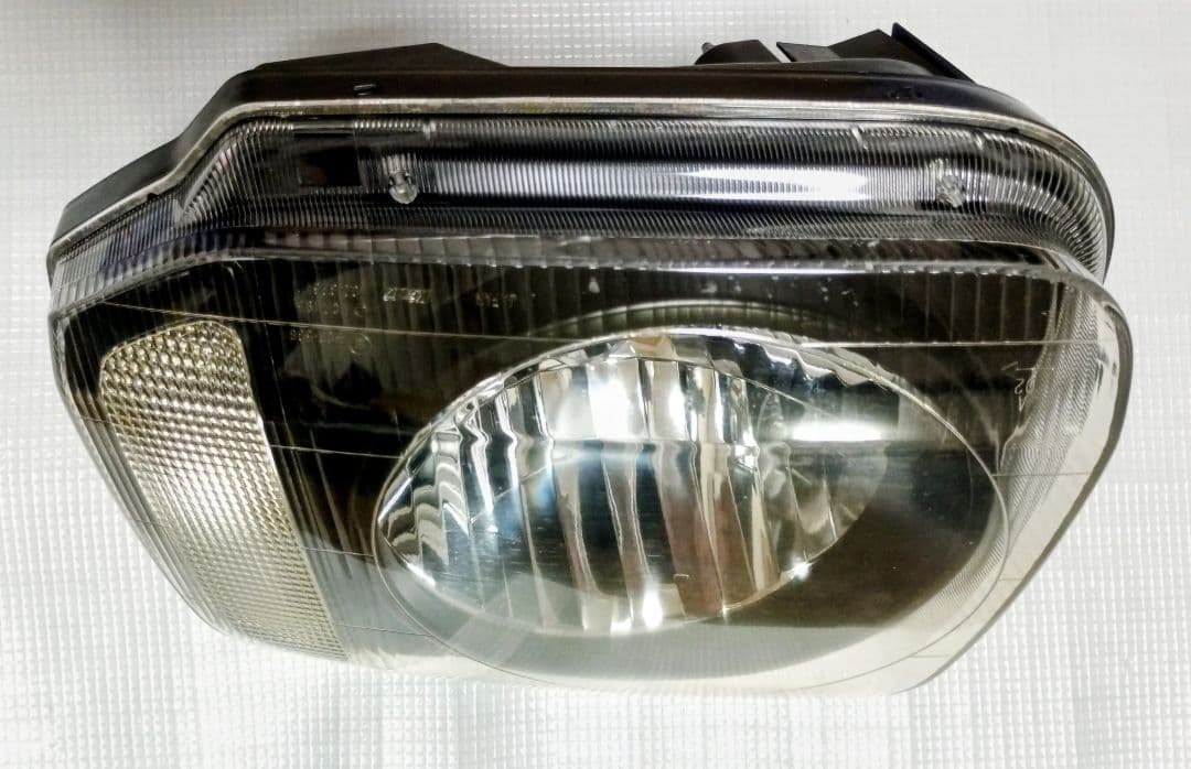 【中古/送料込】ジムニーJB23 スズキ純正ヘッドライト/レベライザー付