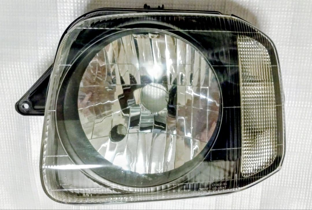 【中古/送料込】ジムニーJB23 スズキ純正ヘッドライト/レベライザー付