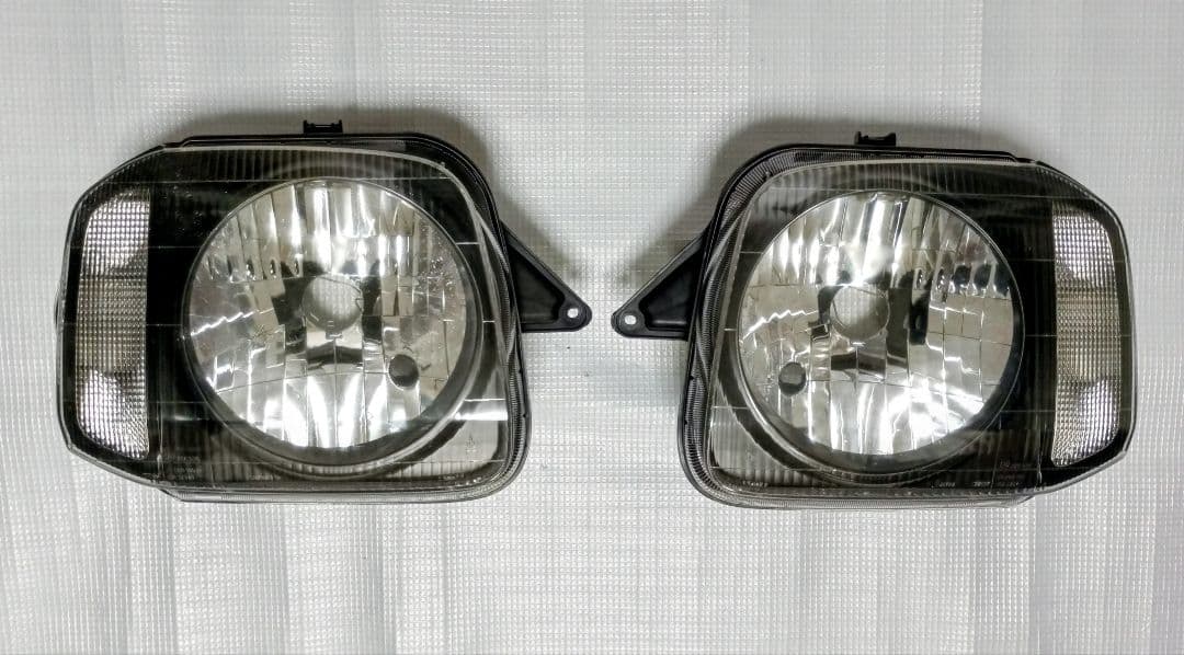 【中古/送料込】ジムニーJB23 スズキ純正ヘッドライト/レベライザー付