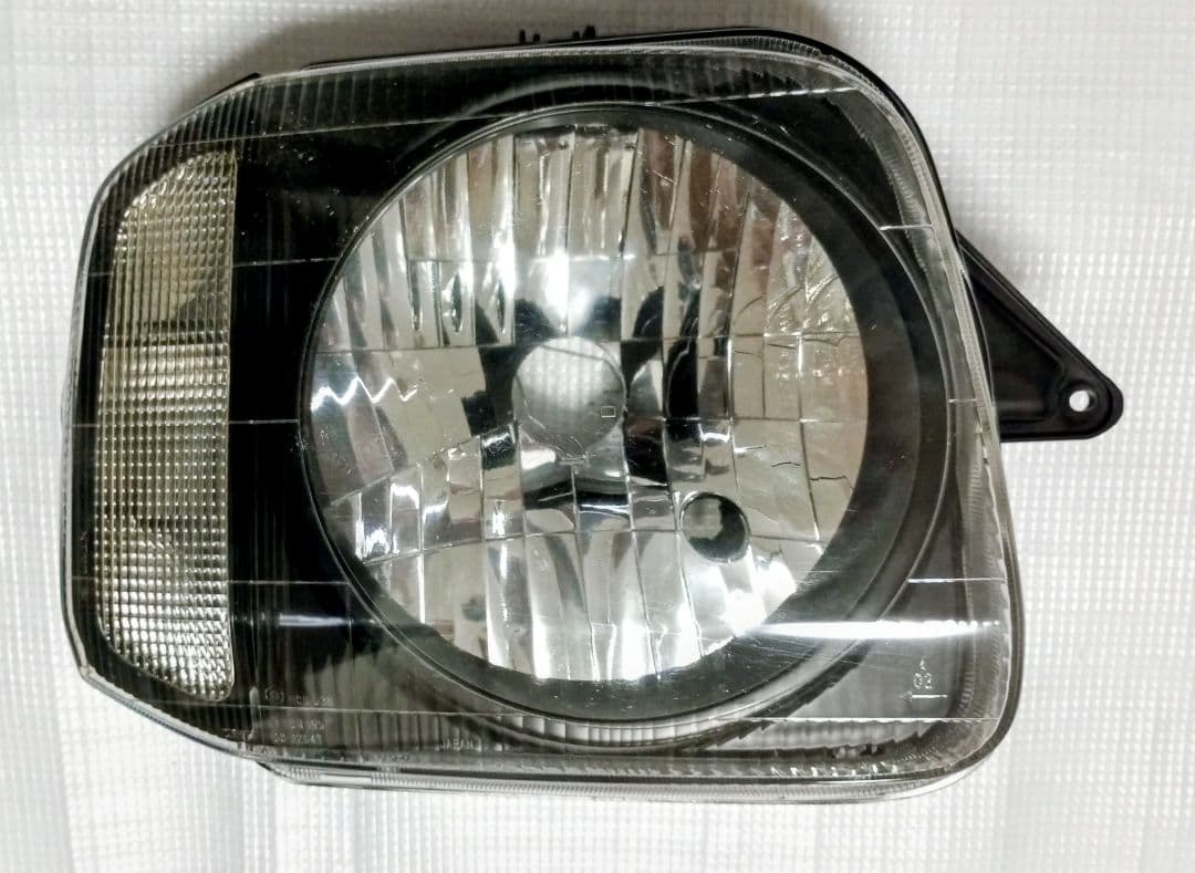 【中古/送料込】ジムニーJB23 スズキ純正ヘッドライト/レベライザー付