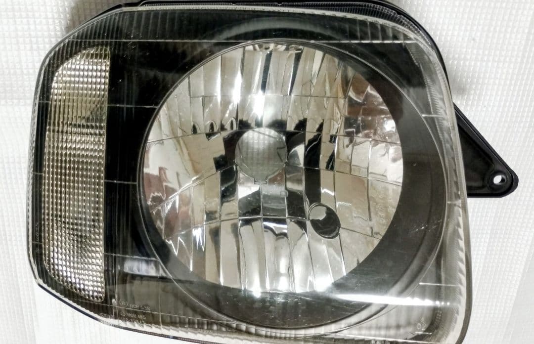 【中古/送料込】ジムニーJB23 スズキ純正ヘッドライト/レベライザー付