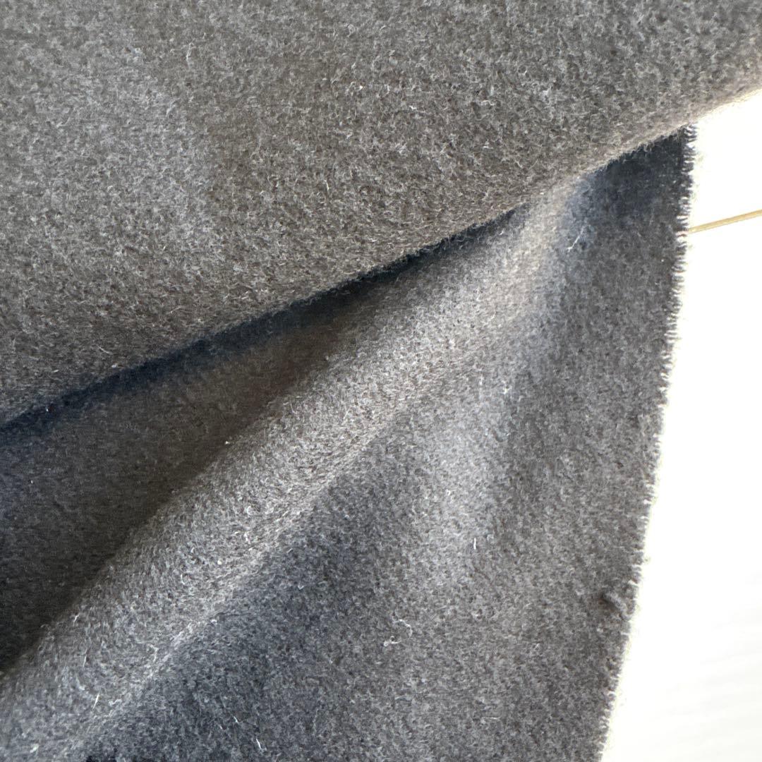 MONCLER 黒ウールマフラー フリンジ付き