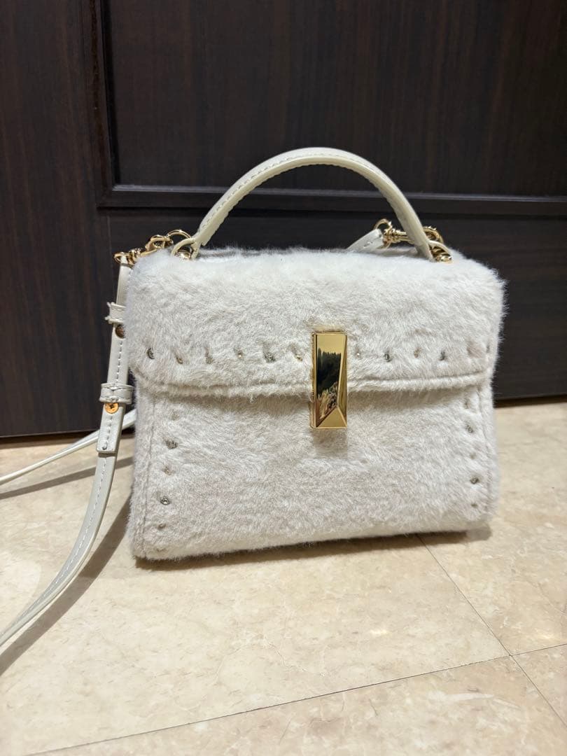 CELFORD 【リュタン】ビジュースタッズファーポシェット