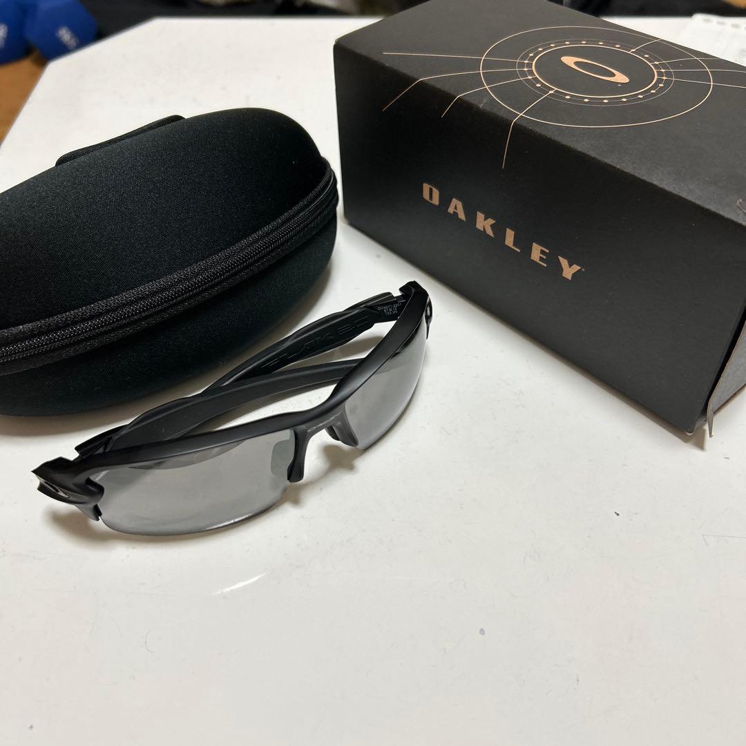 Oakley ブラック サングラス グレー レンズ