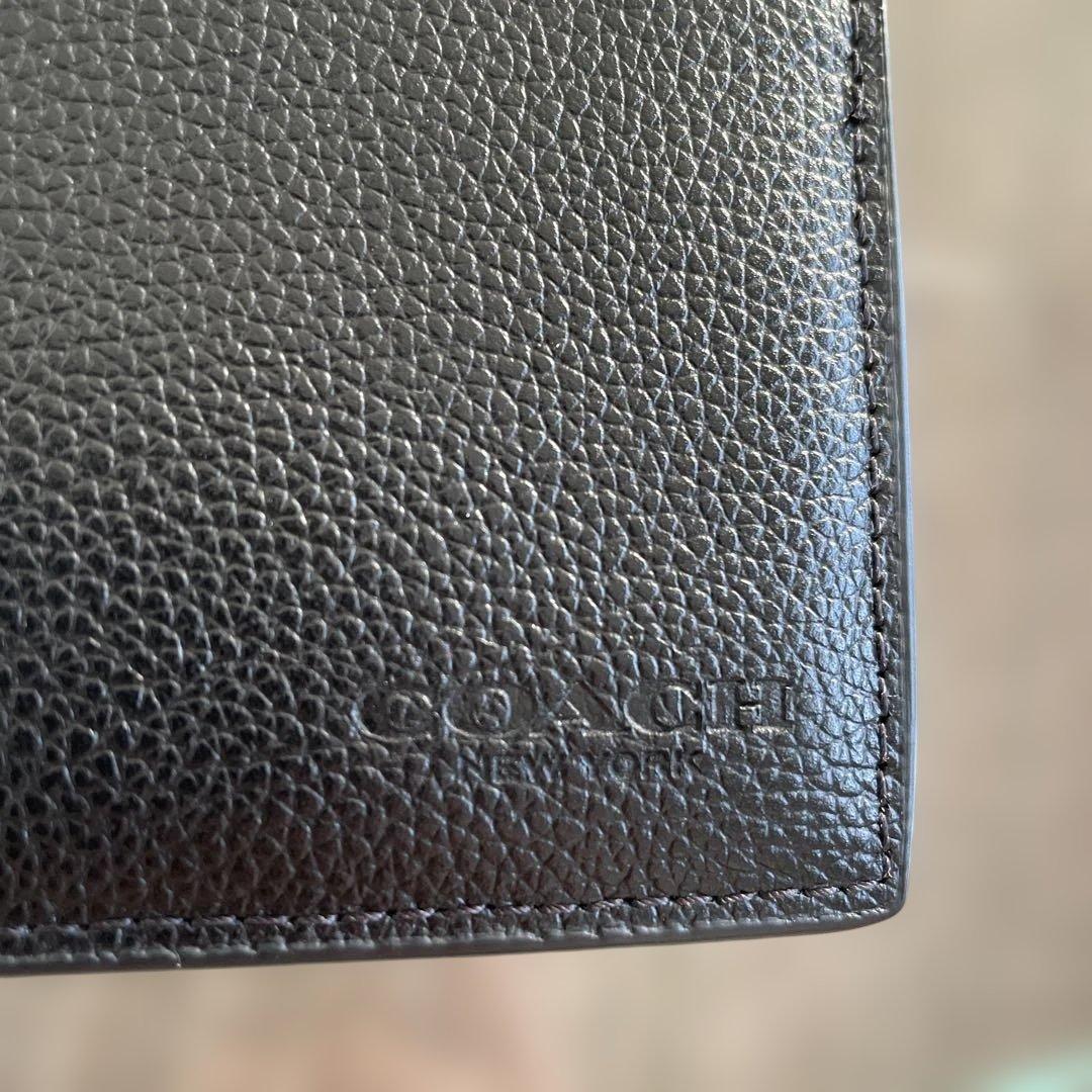 未使用　定価49,500円　COACH ブラック 二つ折り財布 ポケット付