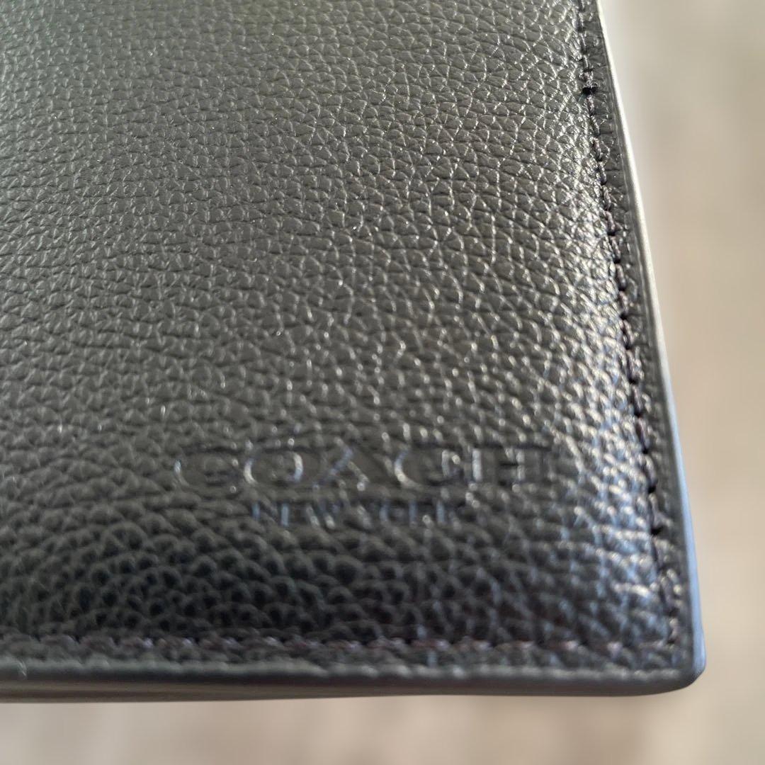 未使用　定価49,500円　COACH ブラック 二つ折り財布 ポケット付