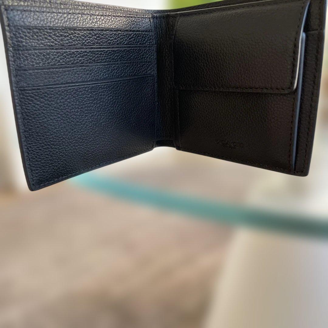 未使用　定価49,500円　COACH ブラック 二つ折り財布 ポケット付