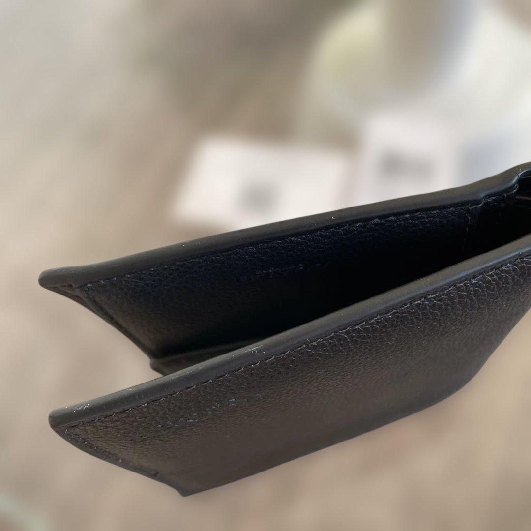 未使用　定価49,500円　COACH ブラック 二つ折り財布 ポケット付