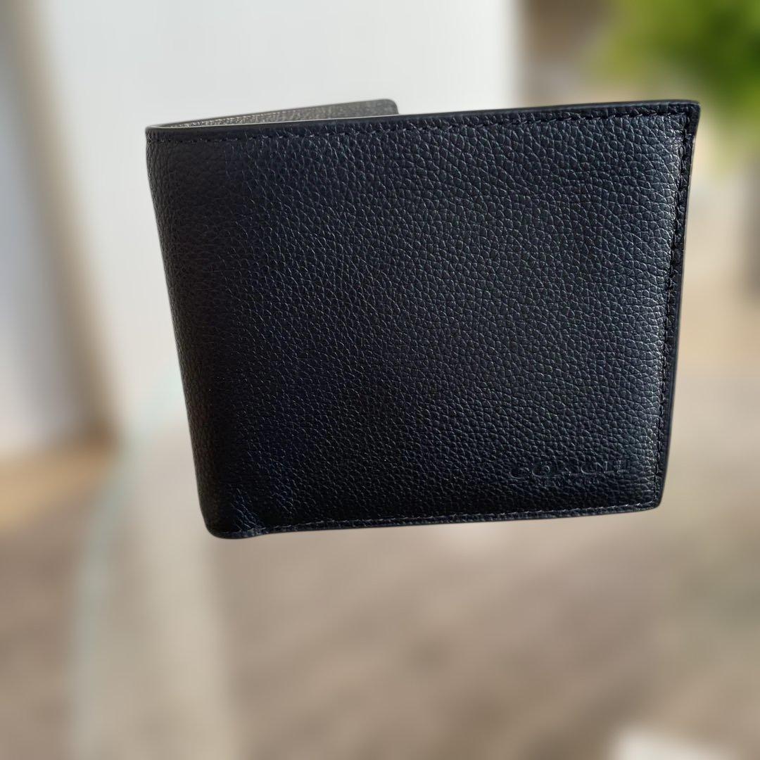 未使用　定価49,500円　COACH ブラック 二つ折り財布 ポケット付
