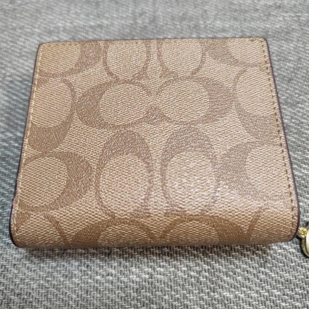 【訳あり】COACH C3309 Cチャーム シグネチャー 二つ折り財布