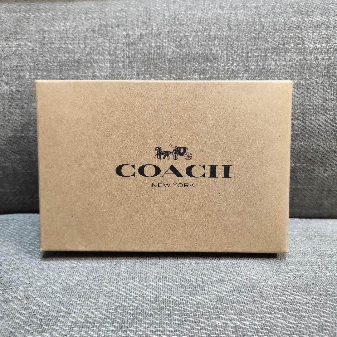【訳あり】COACH C3309 Cチャーム シグネチャー 二つ折り財布