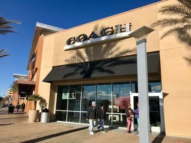 COACH コーチリファインドカーフレザー星柄ミディアム二つ折り財布