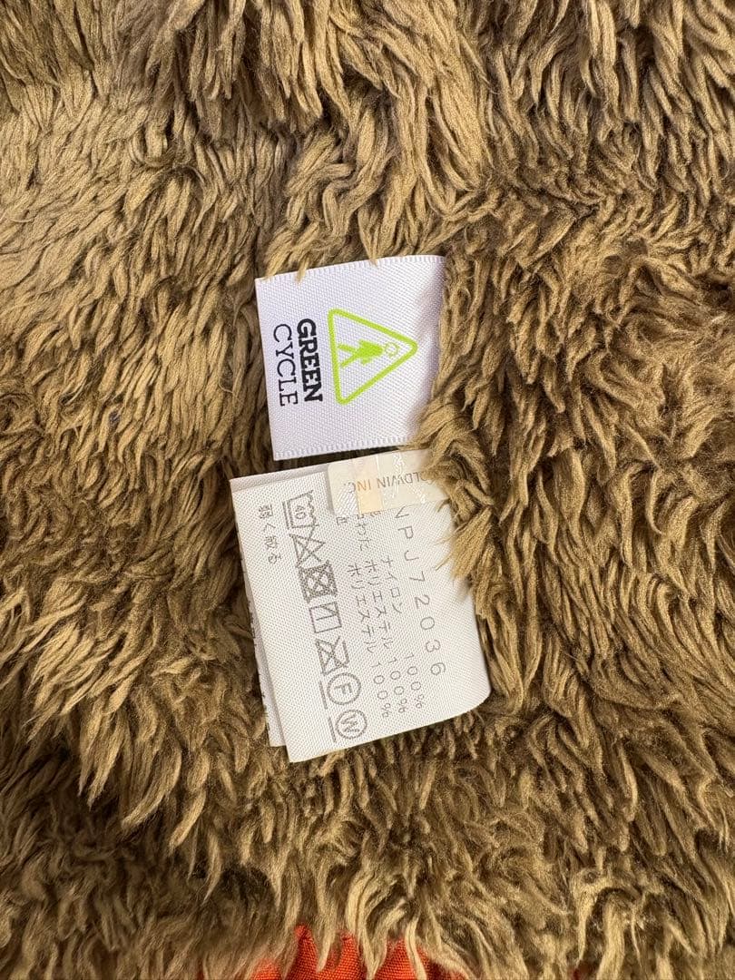 The North Face オレンジ コンパクトノマドジャケット