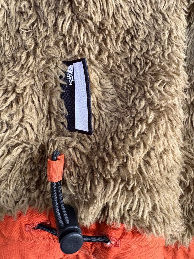 The North Face オレンジ コンパクトノマドジャケット