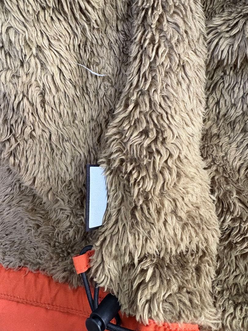 The North Face オレンジ コンパクトノマドジャケット