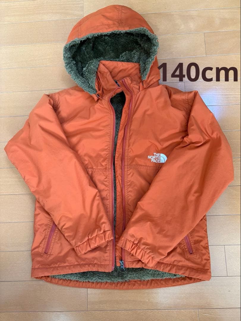 The North Face オレンジ コンパクトノマドジャケット