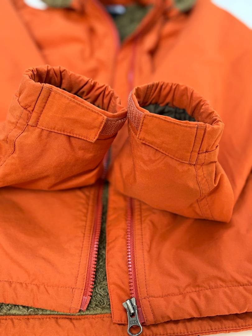 The North Face オレンジ コンパクトノマドジャケット