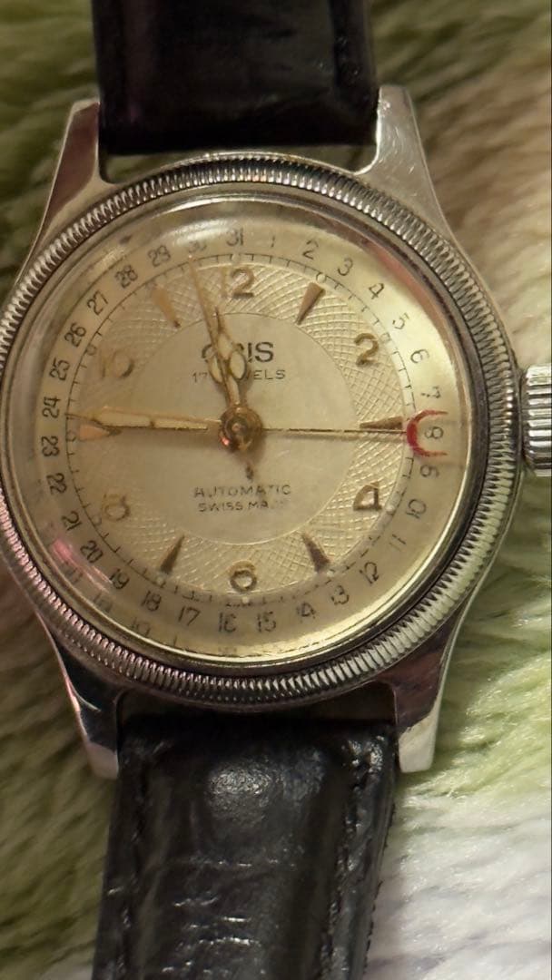 ビンテージのオリス ビッグクラウン ポインターデイト ウォッチです。