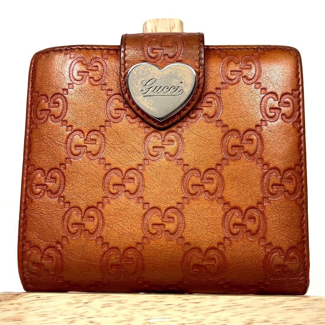 グッチ　二つ折り財布　ハートロゴプレート　GGシマレザー　型押しエンボス　美品