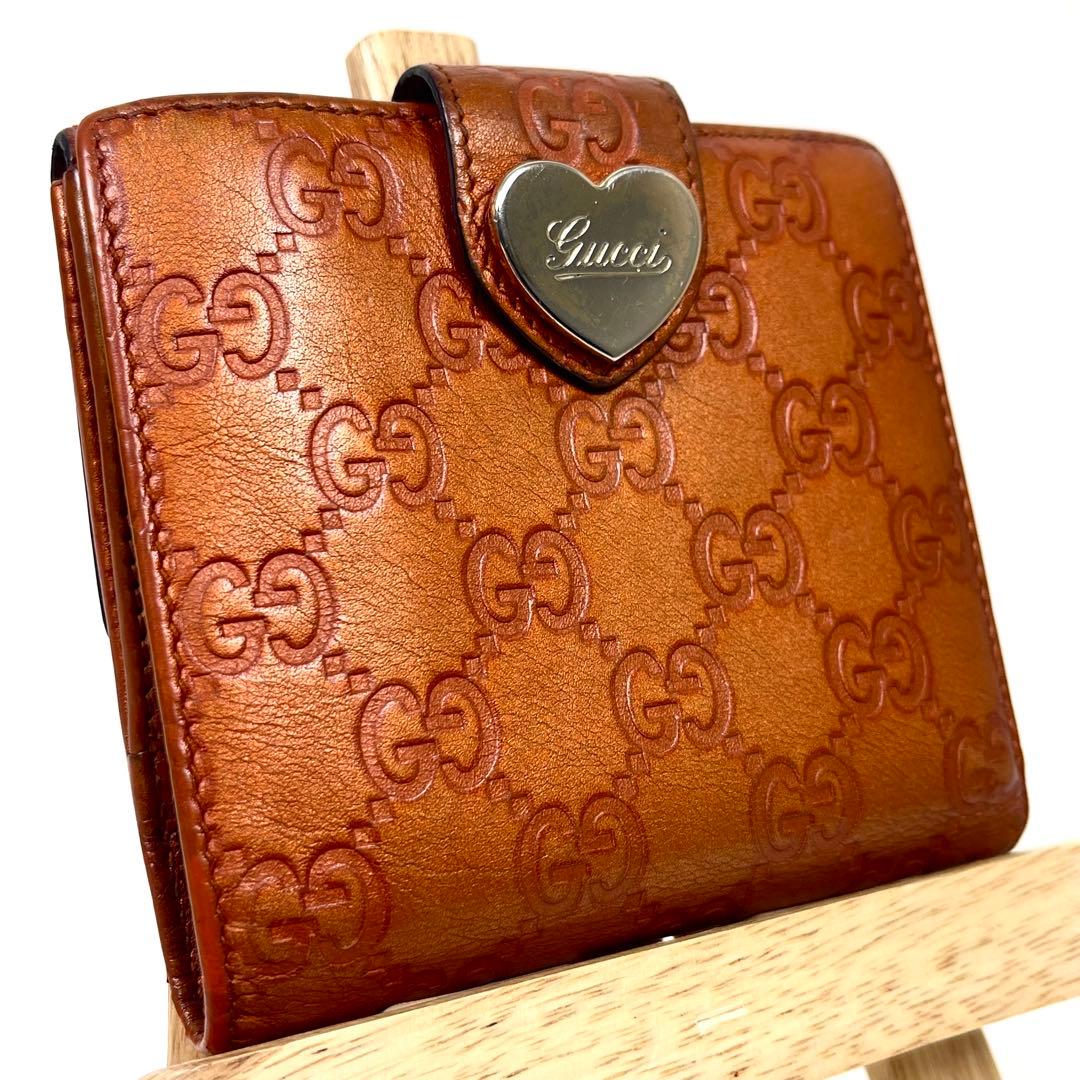 グッチ　二つ折り財布　ハートロゴプレート　GGシマレザー　型押しエンボス　美品