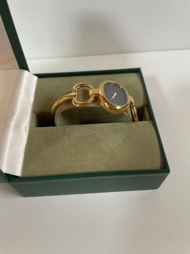 グッチ GUCCI バングルウォッチ レディース 腕時計 ゴールド