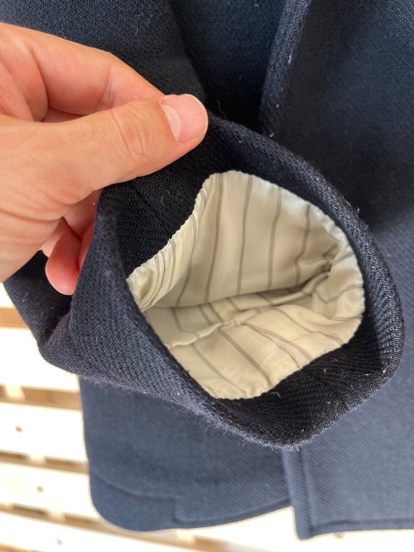 黒いウール混紡ピーコート