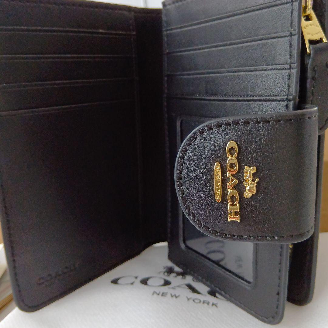 ✨️COACH ブラック シグネチャー✨️　二つ折り財布　保存袋＆お箱付き