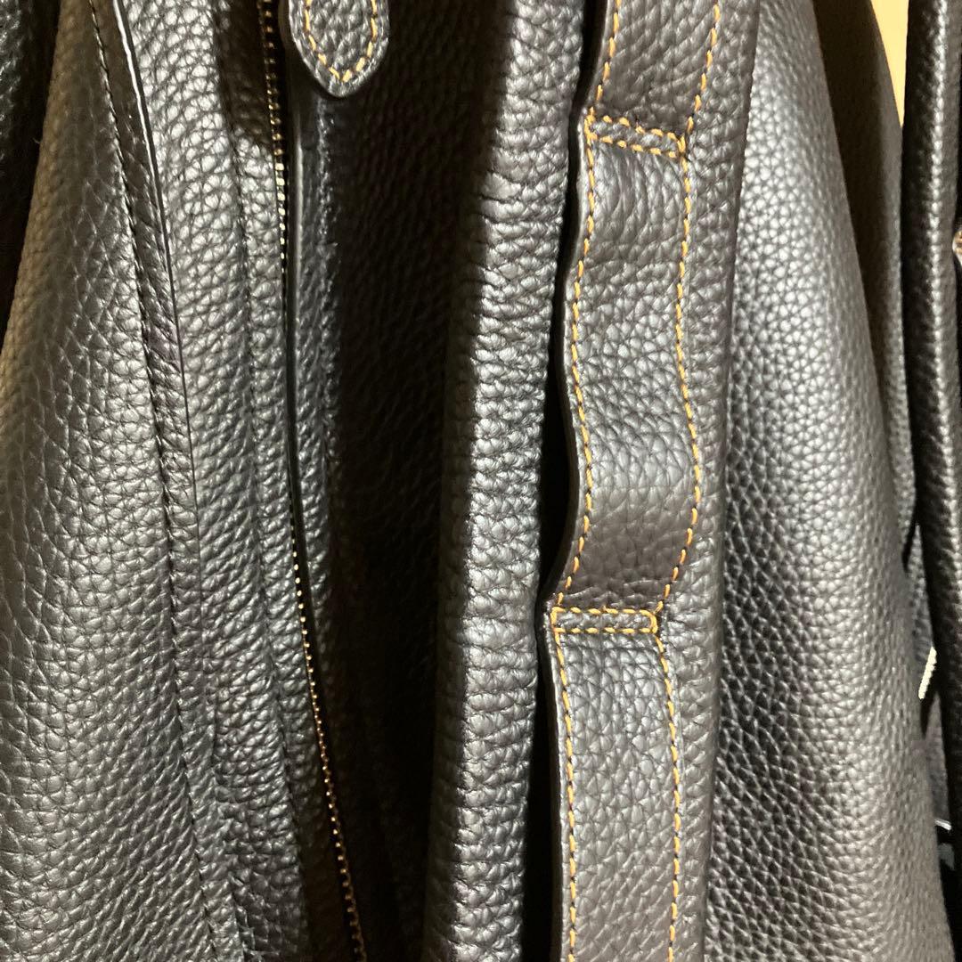 スタッズ付き黒リュック