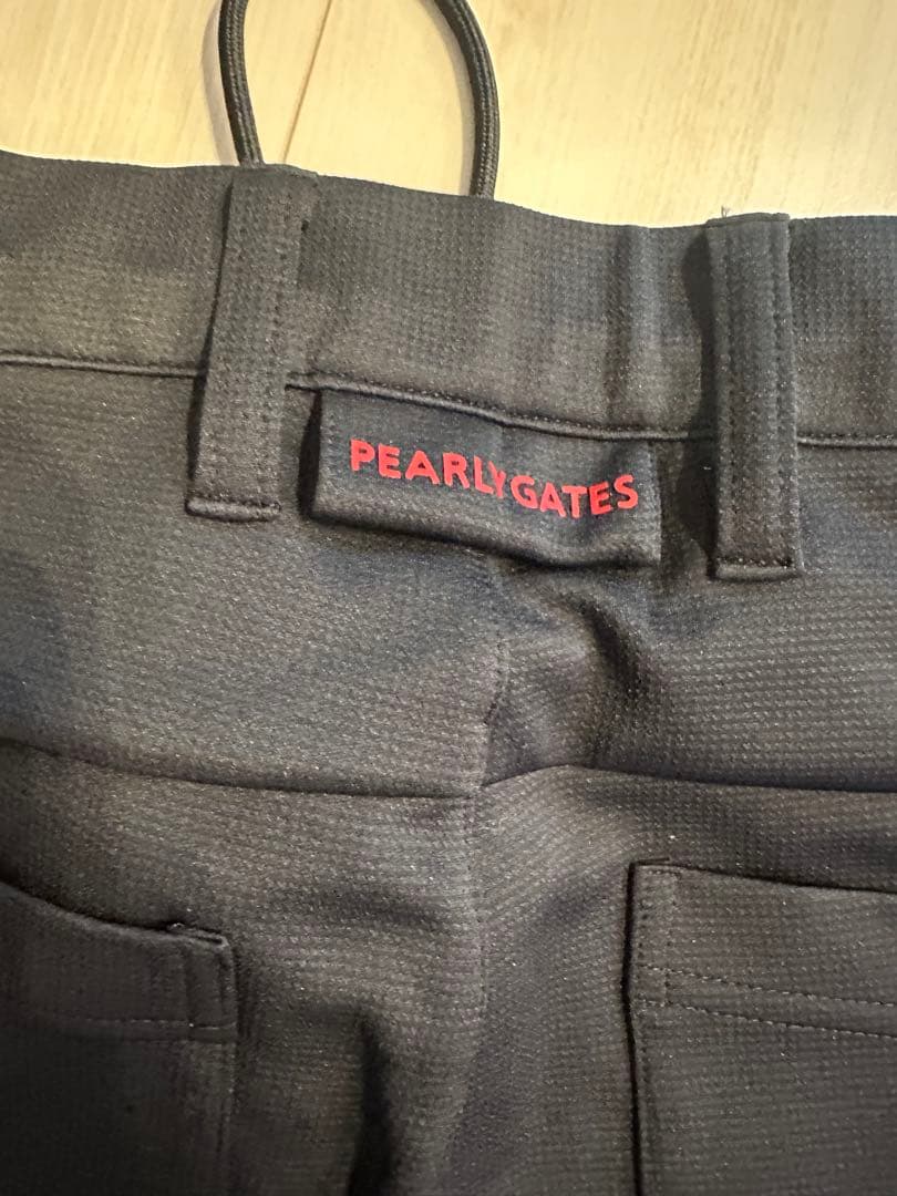 パーリーゲーツ黒のウエスト調整可能なパンツ